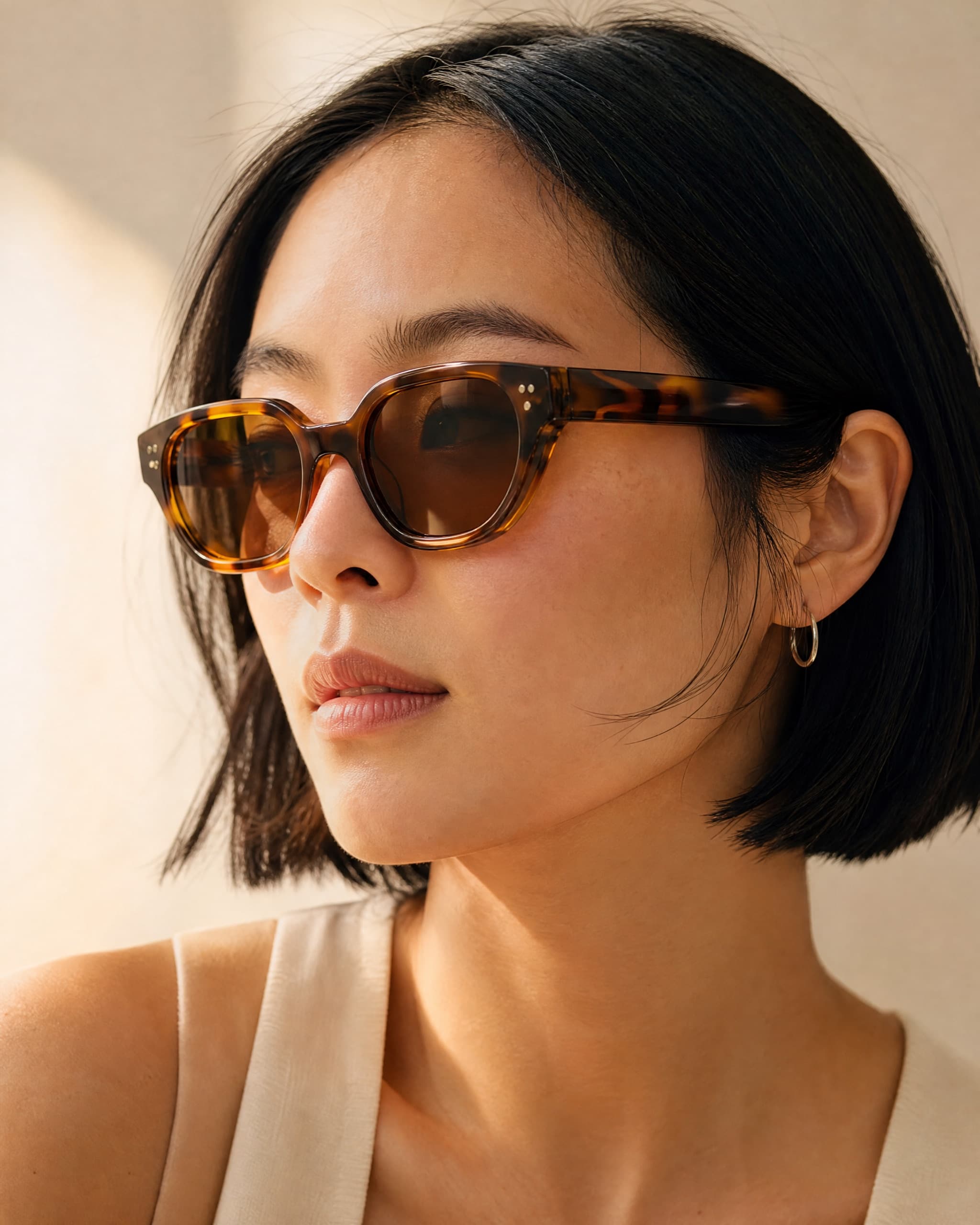 Acetate sunglasses on model, studio cyc